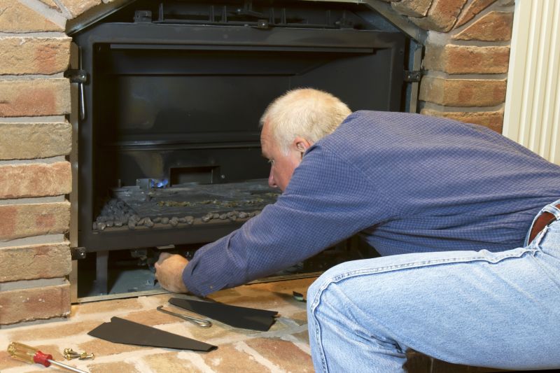 Technician Working on Fireplace